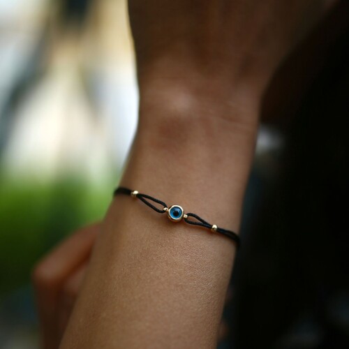 By Golden House - İpli Camgöz Bileklik (1) By Golden House - İpli Camgöz Bileklik (1)